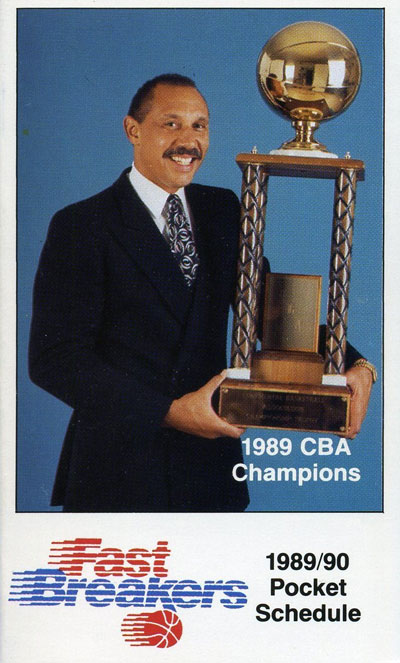Head Coach Henry Bibby poses on a 1989-90 Tulsa Fast Breakers Pocket Schedule from the Continental Basketball Association