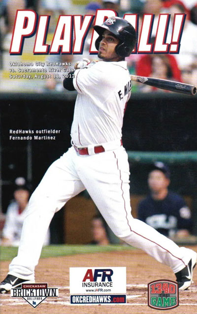 Fernando Martinez on the cover of a 2012 Oklahoma City RedHawks baseball program from the Pacific Coast Baseball League